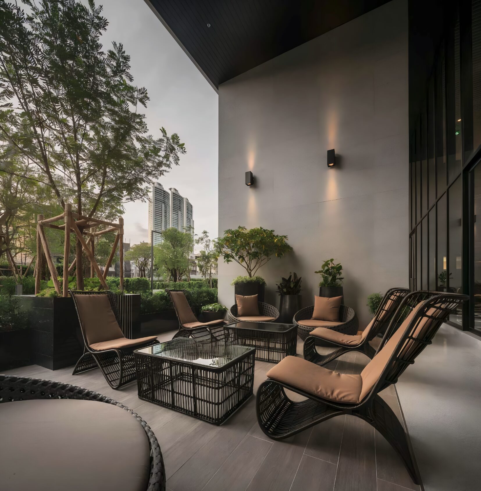 Luxury outdoor Lobby and seating area at Park 24 condominium in Bangkok.